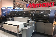 Обновлённый текстильный плоттер Tiger-1800B MkII на выставке FESPA